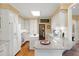 Bright kitchen features granite countertops, white cabinetry, and modern stainless steel appliances at 805 Lee St, Gibsonville, NC 27249