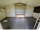 Functional storage shed with built-in shelving for organization and maximizing space at 807 Everett St, Burlington, NC 27215