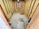 Small storage room with wood framing and shelving, ideal for organization and storage solutions at 807 Everett St, Burlington, NC 27215