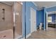 Bathroom featuring a glass-enclosed shower with showerhead and new flooring at 90 Ferncrest Ct, Roxboro, NC 27574