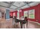 Formal dining room with modern lighting, ceiling detail, ample natural light, and wood-look flooring at 90 Ferncrest Ct, Roxboro, NC 27574