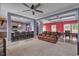 Spacious open concept with living room, dining area, and kitchen featuring coffered ceilings and hardwood floors at 90 Ferncrest Ct, Roxboro, NC 27574