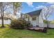 Well maintained backyard and patio area with the house in the background, perfect for entertaining at 924 Elbridge Dr, Raleigh, NC 27603