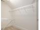 White closet with wire shelving, carpet, and door at 924 Elbridge Dr, Raleigh, NC 27603