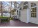 Large home exterior boasts a deck, many windows, and a two car garage at 924 Elbridge Dr, Raleigh, NC 27603