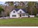 Charming home features a cozy front porch and well-manicured lawn at 924 Elbridge Dr, Raleigh, NC 27603