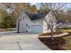Charming two-story home featuring a spacious driveway, attached garage, and well-maintained landscaping at 924 Elbridge Dr, Raleigh, NC 27603