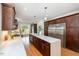 Beautiful kitchen with stainless steel appliances, center island, and wood floors at 924 Elbridge Dr, Raleigh, NC 27603