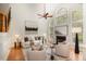 Bright and airy living room with high ceilings, large windows, and stylish decor at 924 Elbridge Dr, Raleigh, NC 27603