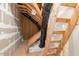 Unfinished interior space displaying the framework and insulation, ready for customization or expansion at 924 Elbridge Dr, Raleigh, NC 27603