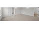 Expansive bedroom with soft carpet and neutral walls, creating a tranquil retreat at 1009 Shovelhead Dr # 5, Durham, NC 27703