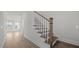 Elegant staircase with wood treads and white risers, showcasing craftsmanship at 1009 Shovelhead Dr # 5, Durham, NC 27703