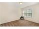 Cozy bedroom with a window and neutral carpet, offering a comfortable and inviting space at 110 White Burley Ct, Durham, NC 27703