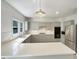 Well-lit kitchen with quartz countertops, stainless steel appliances, and ample storage space at 112 Old Bridge Ln, Chapel Hill, NC 27517