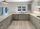 Updated kitchen with stainless steel appliances, and view to backyard at 112 Old Bridge Ln, Chapel Hill, NC 27517