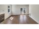 Inviting living room featuring a fireplace and French doors leading to the outside at 112 Old Bridge Ln, Chapel Hill, NC 27517