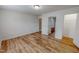 This luminous bedroom offers ensuite access, and continuous wood-look vinyl flooring at 1171 Jackson Ct, Creedmoor, NC 27522