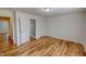 This spacious bedroom features seamless vinyl flooring and a neutral color palette at 1171 Jackson Ct, Creedmoor, NC 27522