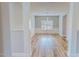 Dining room features wood-look floors and wainscoting at 1171 Jackson Ct, Creedmoor, NC 27522