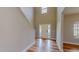 Bright entryway with tall ceilings, wood-look floors, and a white front door at 1171 Jackson Ct, Creedmoor, NC 27522
