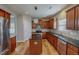 Well-equipped kitchen featuring an island, stainless steel appliances, and sleek black countertops at 1171 Jackson Ct, Creedmoor, NC 27522
