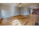 Spacious living room features an open concept floor plan and wood-look flooring throughout at 1171 Jackson Ct, Creedmoor, NC 27522