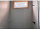 Bright tiled shower with a window, showing a modern bathroom design at 1216 Barcroft Pl, Raleigh, NC 27615