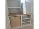 Custom white cabinetry with light wood countertops offers stylish storage in this home at 1216 Barcroft Pl, Raleigh, NC 27615