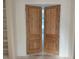 Elegant wood paneled doors frame the entryway, adding character and charm to the home at 1216 Barcroft Pl, Raleigh, NC 27615