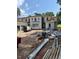 New home exterior showcasing a sprawling lawn with pristine landscaping at 1216 Barcroft Pl, Raleigh, NC 27615