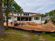Spacious two-story home featuring large windows and a flat roof design at 1216 Barcroft Pl, Raleigh, NC 27615