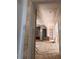 View of unfinished hallway under construction and view of rooms in the distance at 1216 Barcroft Pl, Raleigh, NC 27615