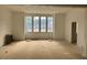 Spacious living room filled with lots of windows for abundant natural light at 1216 Barcroft Pl, Raleigh, NC 27615