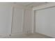 Bright living room featuring painted wall paneling and trim at 1216 Barcroft Pl, Raleigh, NC 27615
