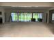 Open-concept living room with sliding glass doors leading to backyard at 1216 Barcroft Pl, Raleigh, NC 27615