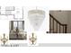 Stair and loft design with statement chandelier, window seating, and elegant wall sconces at 1216 Barcroft Pl, Raleigh, NC 27615