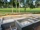A modern pool and jacuzzi under construction, offering a luxurious outdoor living experience at 1216 Barcroft Pl, Raleigh, NC 27615