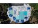 Aerial view of the community pool and lounge area with ample seating and umbrellas at 1216 Barcroft Pl, Raleigh, NC 27615