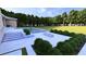 Beautiful backyard pool, patio, and lush landscaping at 1216 Barcroft Pl, Raleigh, NC 27615