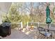 Deck with seating, a grill, and string lights, creating an inviting outdoor space at 1417 Hathaway Rd, Raleigh, NC 27608