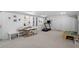 Finished basement featuring carpet flooring, play area, and bright lighting at 1417 Hathaway Rd, Raleigh, NC 27608