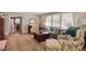 Spacious living room with large windows, plush seating, and stylish decor, perfect for entertaining guests at 1417 Hathaway Rd, Raleigh, NC 27608
