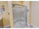Modern bathroom features a glass-enclosed shower with tile surround at 1481 Country Club Rd, Roxboro, NC 27574