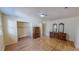 Bedroom with hardwood floors, closet, and furniture at 1481 Country Club Rd, Roxboro, NC 27574