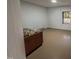 View of a neutral toned bedroom with a window and some furniture at 1481 Country Club Rd, Roxboro, NC 27574