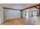 Dining room featuring hardwood floors and an entry door at 1481 Country Club Rd, Roxboro, NC 27574