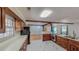 Kitchen with marble flooring, built in oven, and wood cabinets at 1481 Country Club Rd, Roxboro, NC 27574