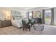 Cozy bedroom features a tray ceiling, two windows, carpeted floors, and stylish decor at 15 Atherton Circle, Angier, NC 27501