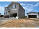 New two-story home with a two-car garage and a separate unfinished detached one-car garage offering flexible space at 15 Atherton Circle, Angier, NC 27501