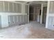 Unfinished living room featuring windows offering natural light and an open concept ready for customization at 15 Atherton Circle, Angier, NC 27501